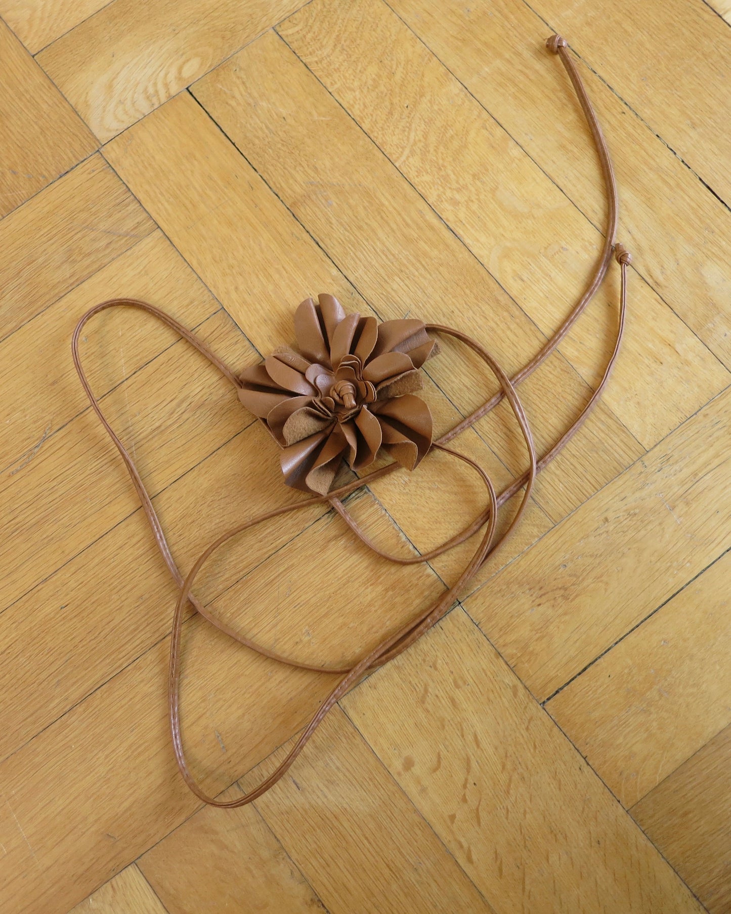 Brown leather flower accessory