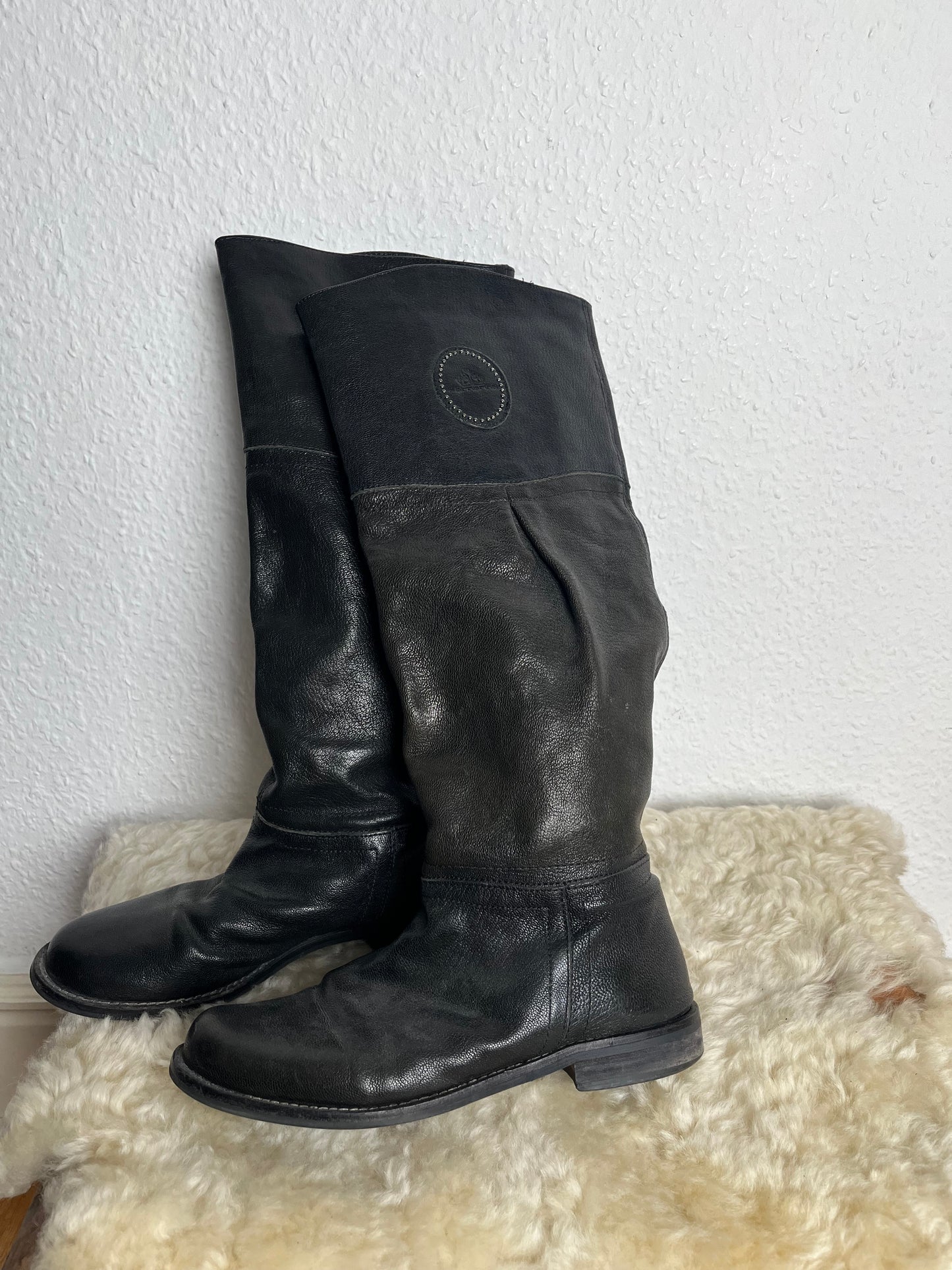 Black leather riding boots