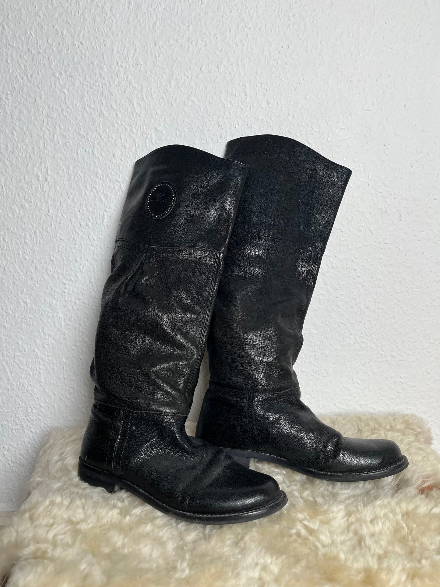 Black leather riding boots