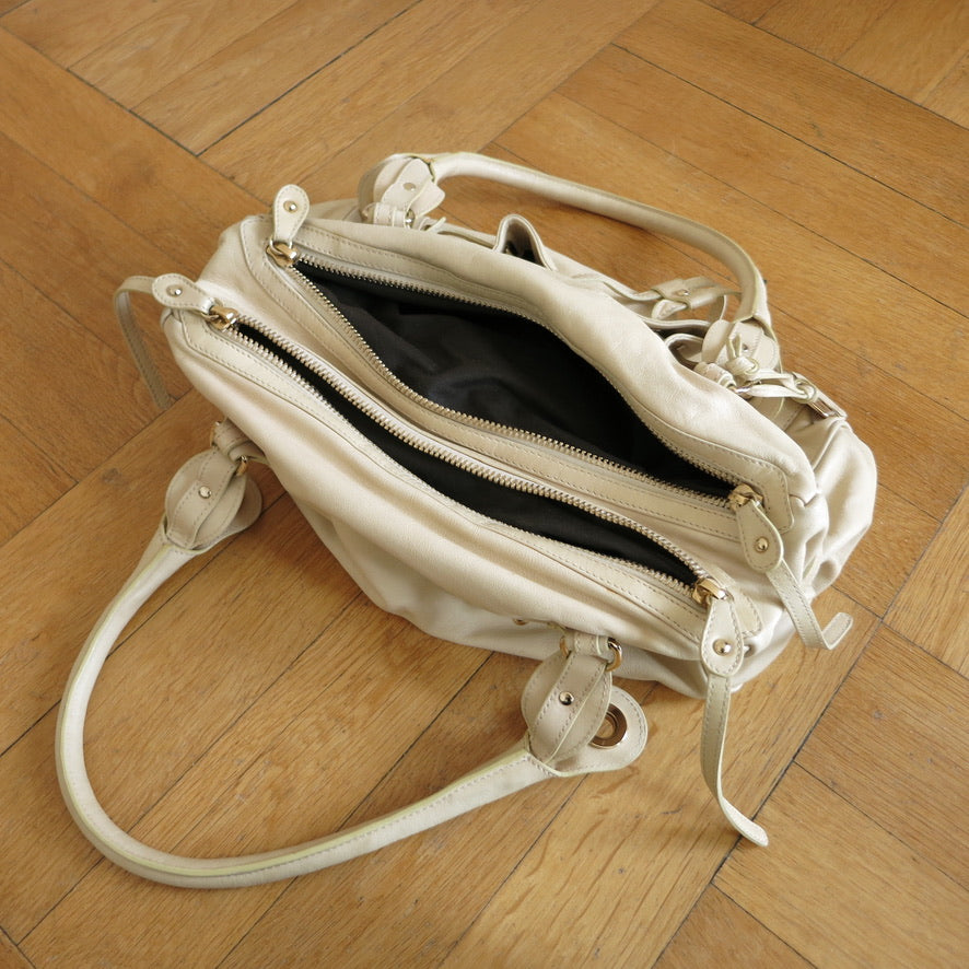 Alessandro dell'Acqua purse