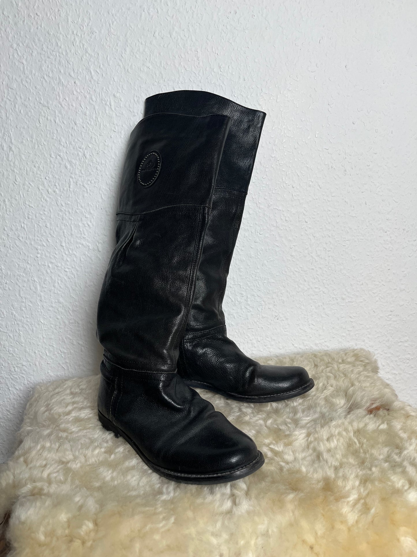 Black leather riding boots