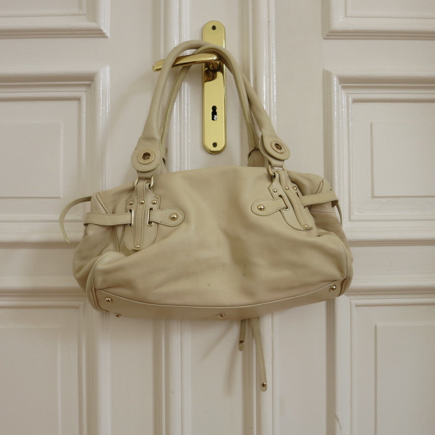 Alessandro dell'Acqua purse