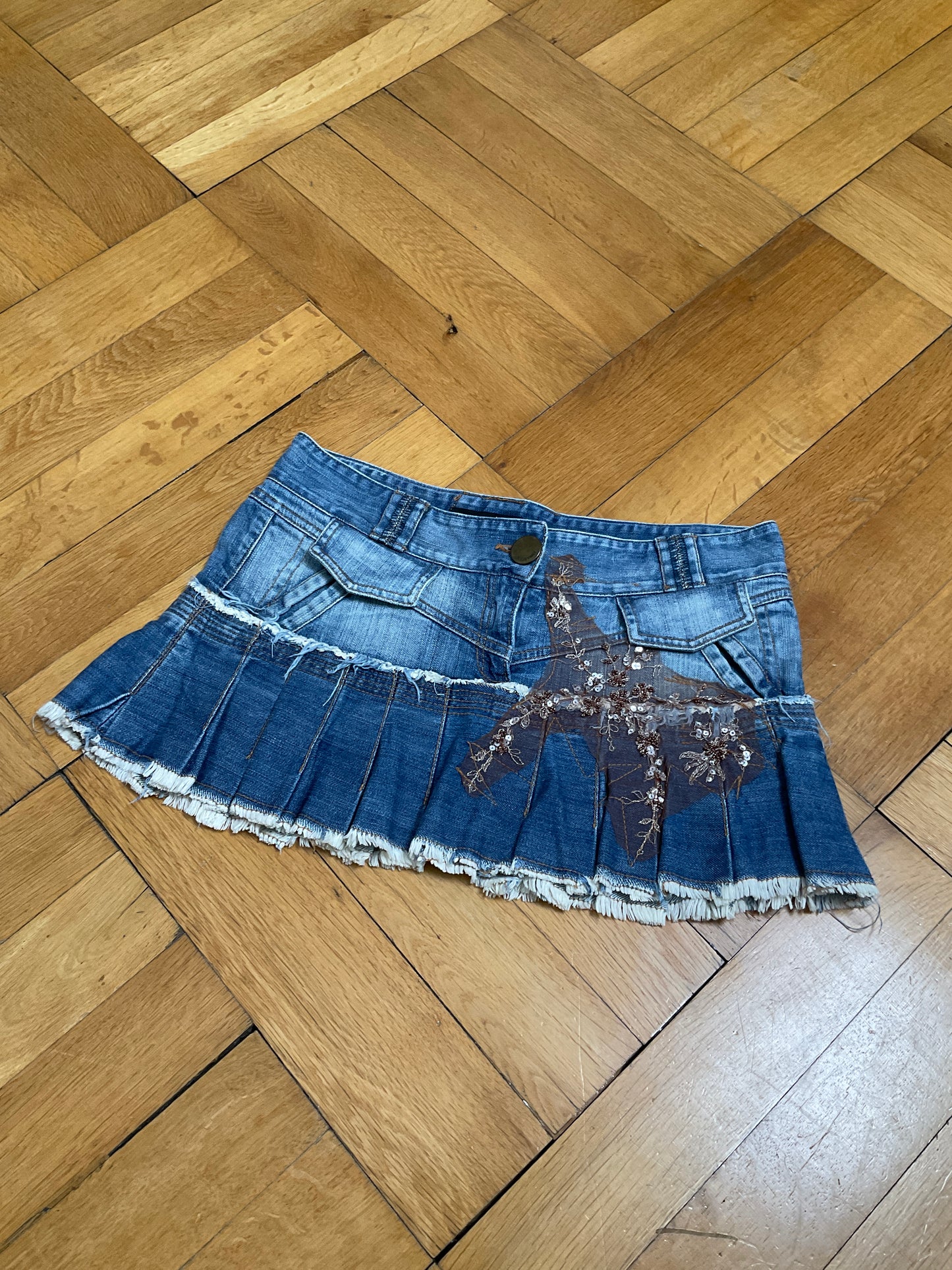 Pleated denim miniskirt