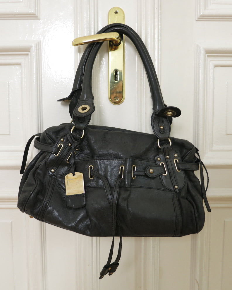 Alessandro dell'Acqua purse