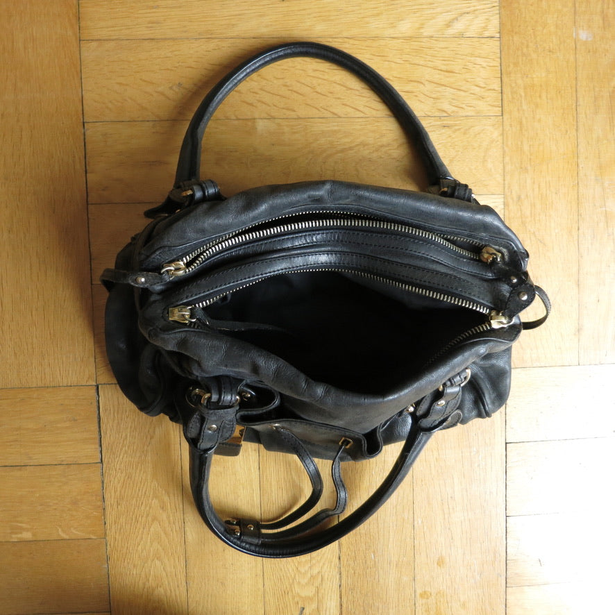 Alessandro dell'Acqua purse