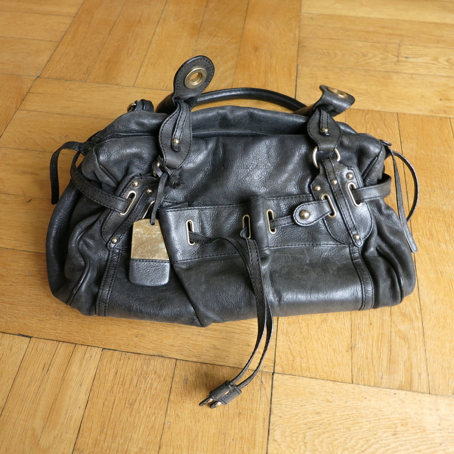 Alessandro dell'Acqua purse