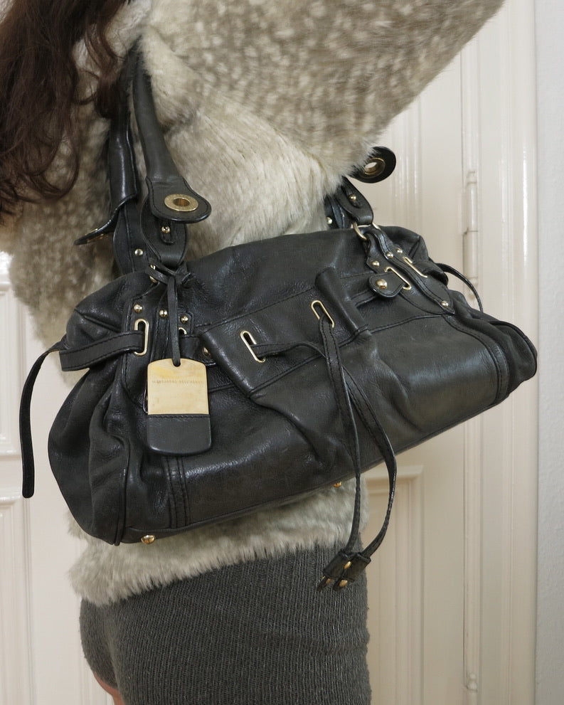 Alessandro dell'Acqua purse
