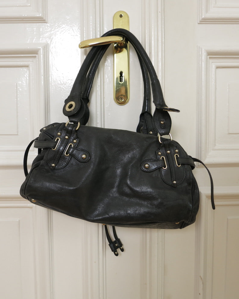 Alessandro dell'Acqua purse