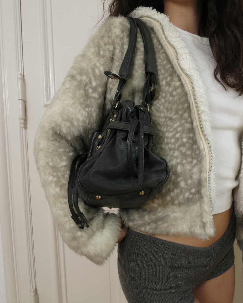 Alessandro dell'Acqua purse
