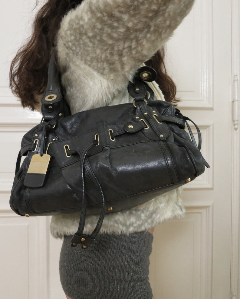 Alessandro dell'Acqua purse
