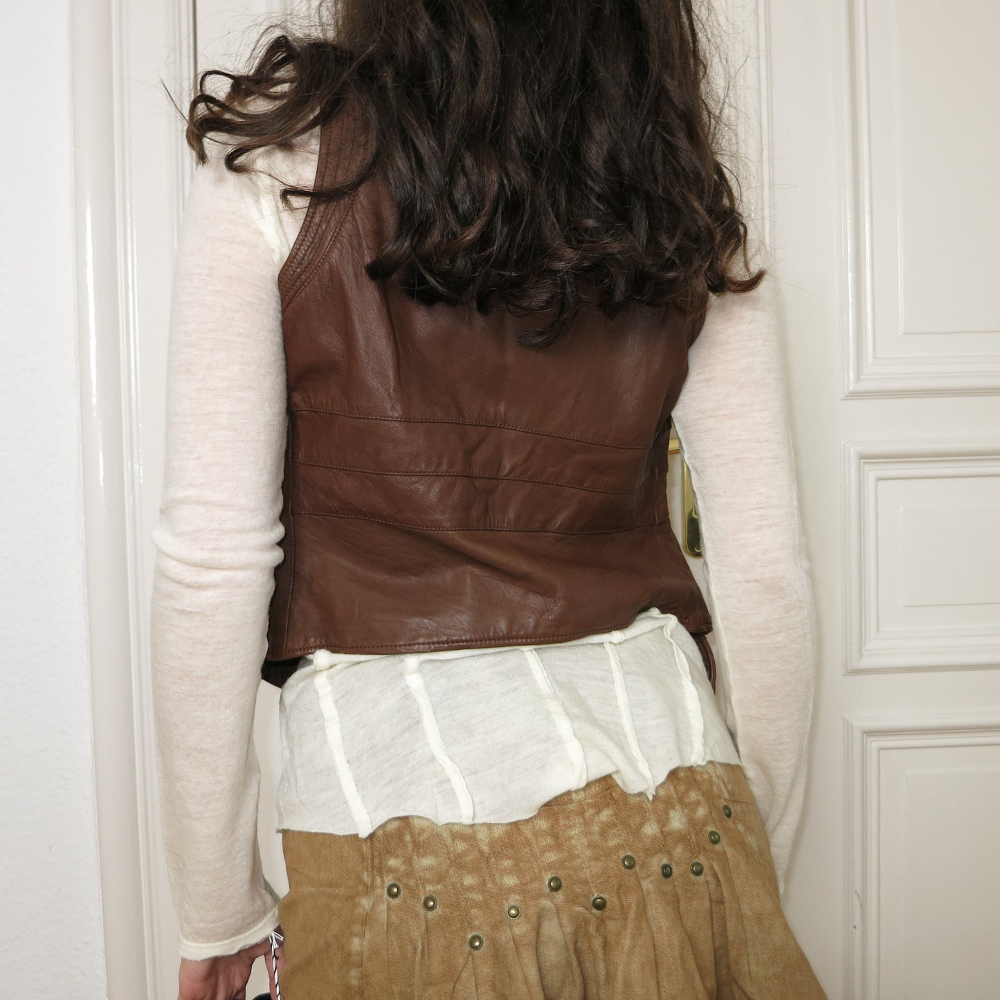 Brown leather vest