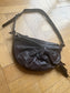 Brown leather bag with gathering