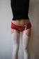 eithne padraigin ni bhraonain red and white hotpants