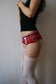 eithne padraigin ni bhraonain red and white hotpants