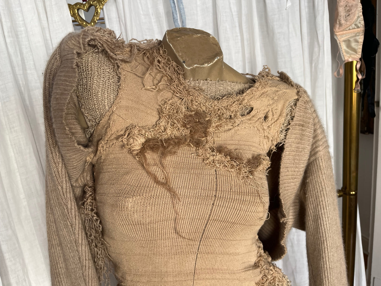 annina “les sœurs”distressed cashmere sweater