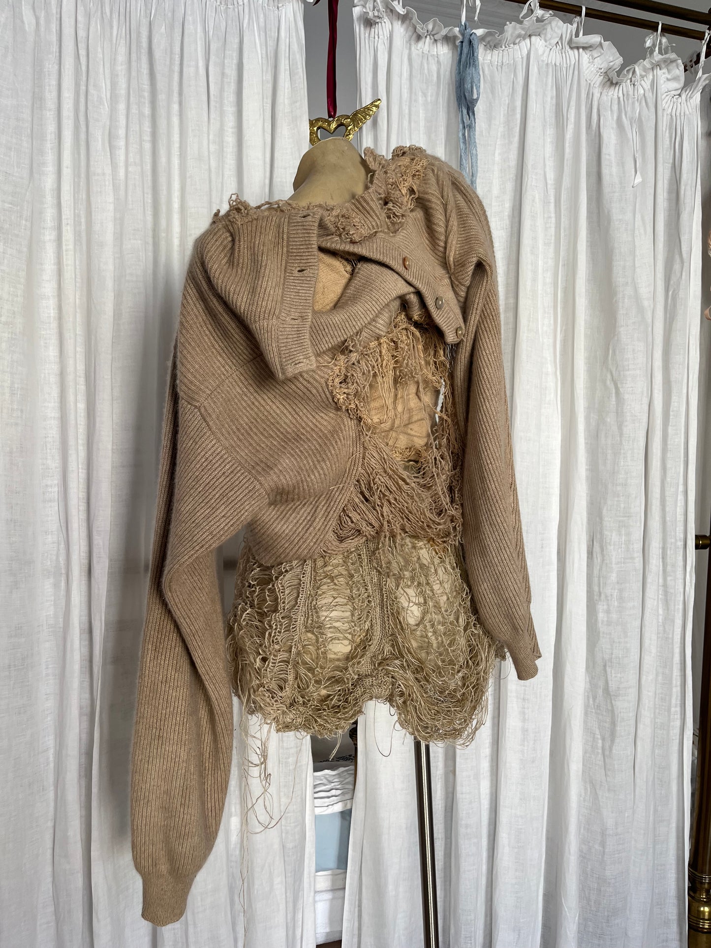 annina “les sœurs”distressed cashmere sweater