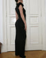 Black evening gown with feathers