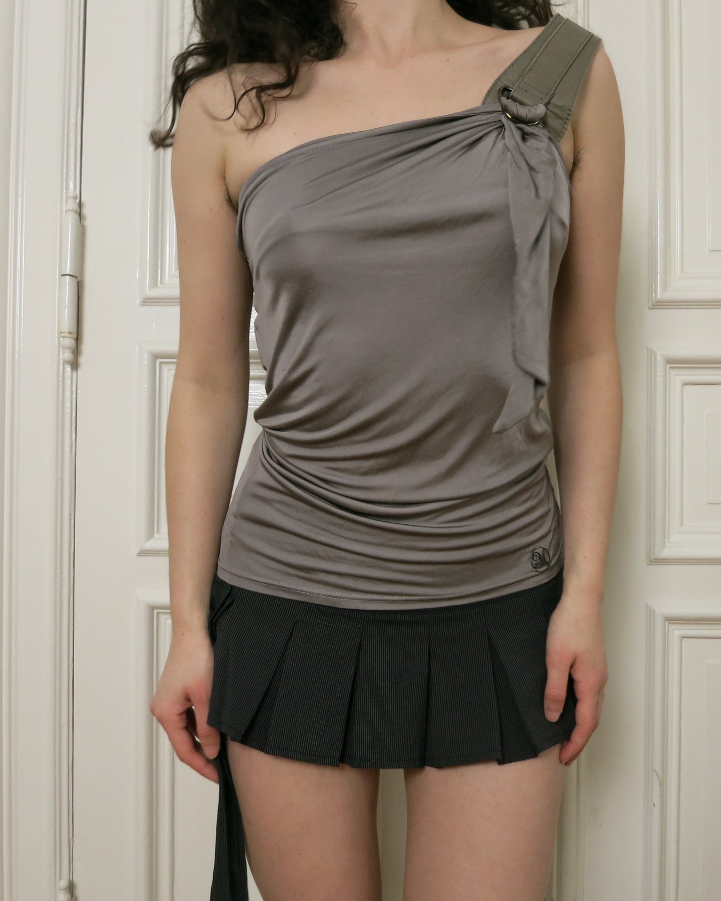 Asymmetrical top with leather buckle