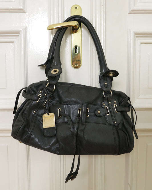 Alessandro dell'Acqua purse