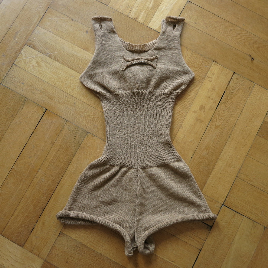 eithne padraigin ni bhraonain - beige knit onesie