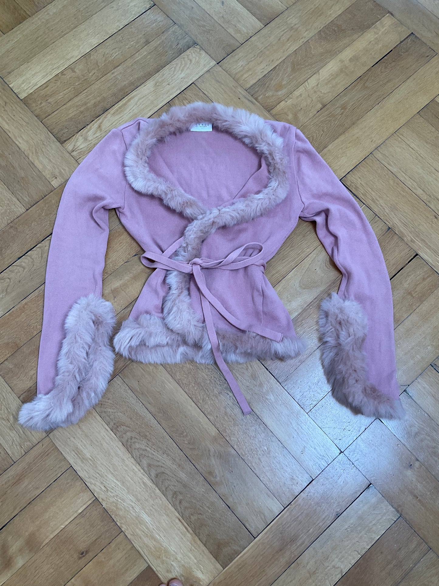 Pink cardigan with faux fur trimmings