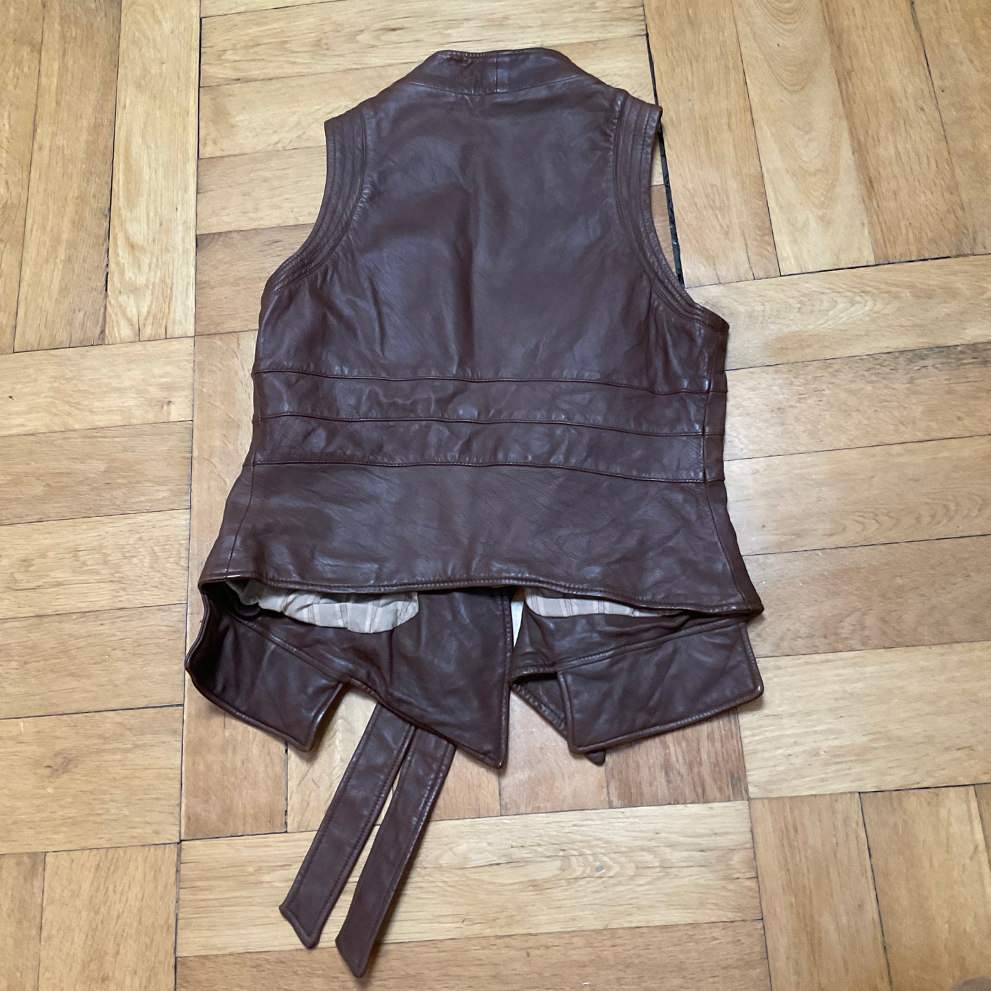 Brown leather vest